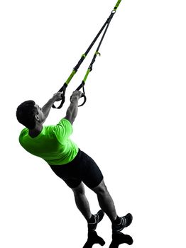 one caucasian man exercising  suspension training trx  on white background