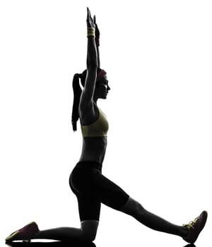 one woman exercising fitness workout balance stretching in silhouette on white background