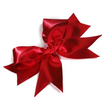 Shiny red satin bow isolated on white background