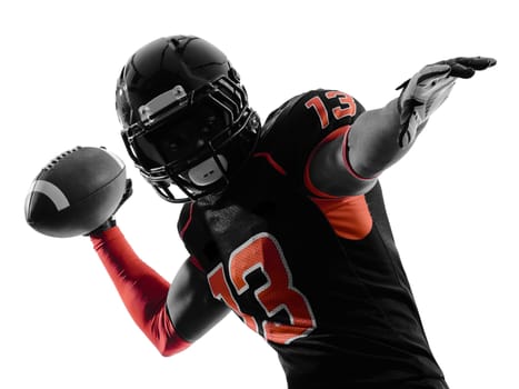one american football player quarterback passing portrait in silhouette shadow on white background