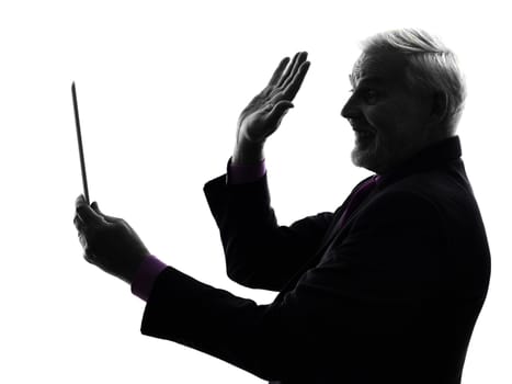 One Caucasian Senior Business Man holding digital tablet saluting Silhouette White Background