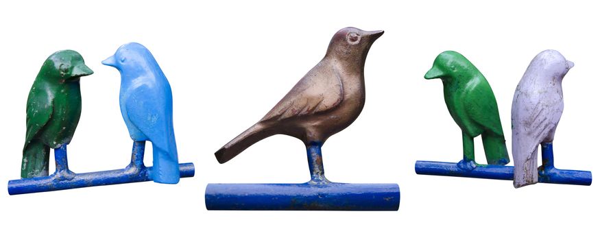 The Set of isolated metal birds on perches