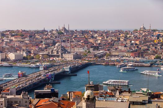 ISTANBUL, TURKEY ��� APRIL 28: The New Mosque and neighborhoods along the Bosphorus on April 28, 2012 in Istanbul, Turkey prior to Anzac Day.  The Bosphorus divides Turkey between Europe and Asia.  