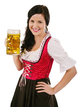 Photo of a beautiful woman wearing traditional dirndl and drinking a huge beer.