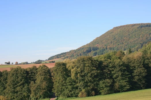 Mountains with forested mountain