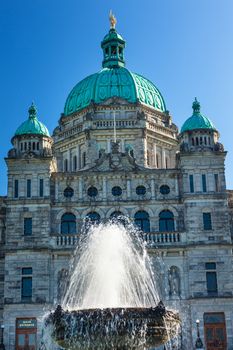 Provincial Capital Legislative Parliament Buildiing Victoria British Columbia Canada.  Gold Statue top of dome is of George Vancouver.