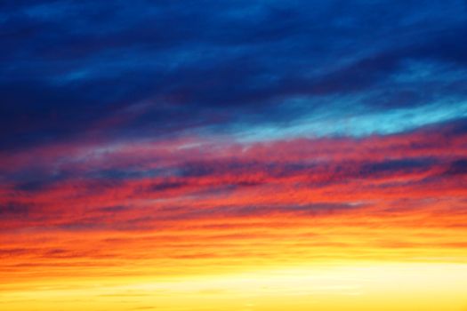 Stunning sunset with very colorful clouds, nature background