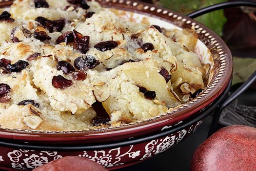 Pear crisp made with cranberries and almonds and fresh pears.