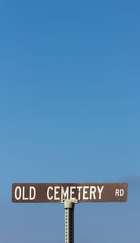 Rusty Sign to Old Cemetery Road in Vertical