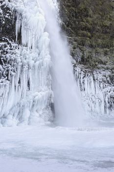 Frozen Pool with Icicles at Horsetail Falls at Columbia River Gorge Oregon in Winter