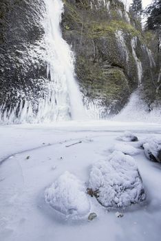 Horsetail Falls at Columbia River Gorge in Oregon Frozen in Winter Season Vertical