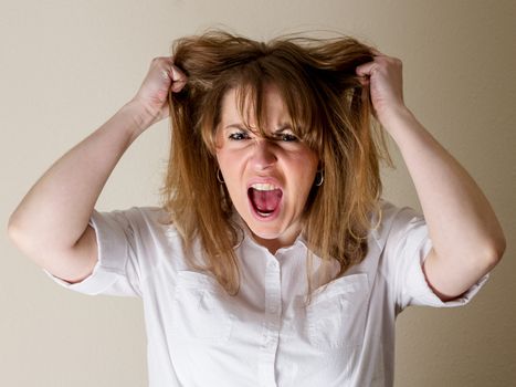 Woman who can be either a student, business woman, or a mother is stressed out