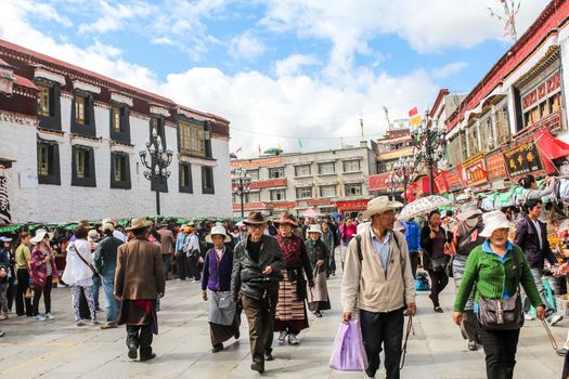 LHASA, TIBET, CHINA - SEPTEMBER 6: Busy old street with farmers markets, in Lhasa, Tibet, China, on September 6, 2013.