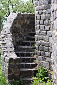 An ancient ladder at the old stone castle