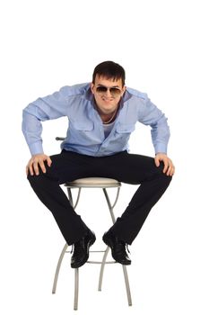 Funny guy sitting on the chair isolated on the white