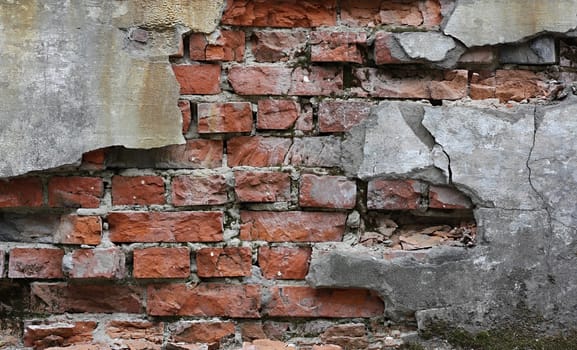 Broken bricks at the old obsolete wall