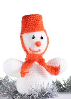 Happy snowman made from threads at the white background