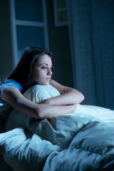 Portrait of a young woman suffering from insomnia