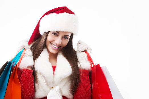 Young beautiful woman shopping for christmas gifts
