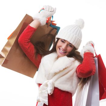 Beautiful young woman with her shopping bags