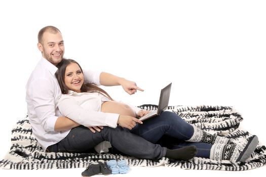 Happy family. Man and pregnant woman. Isolated on a white background.