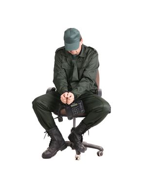 Man in workwear tied up with wire. Isolated on a white background.