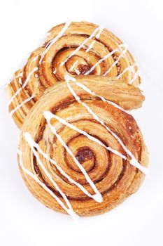 cinnamon danish isolated on white background.