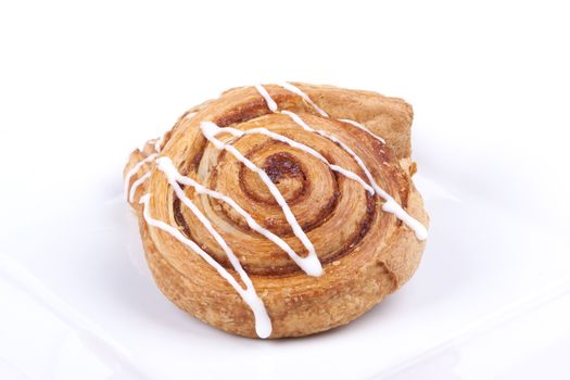 cinnamon danish isolated on white background.