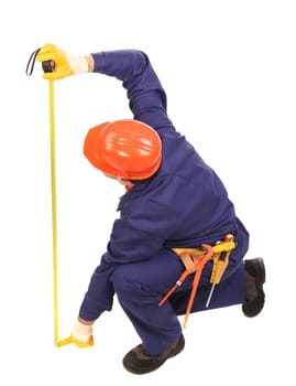 Worker in hard hat measure with ruler. Isolated on a white background.