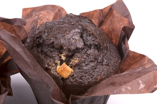 Chocolate Muffin isolated on a white background.