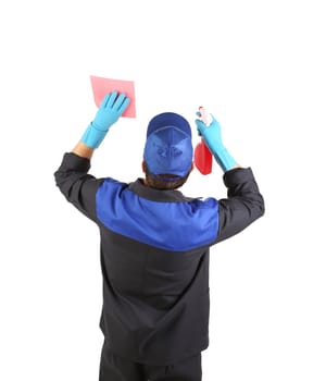 Man holds spray bottle and sponge. Isolated on a white background.