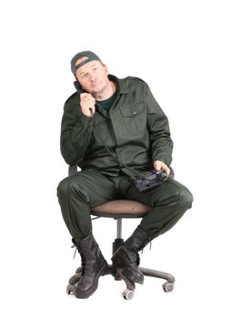 Worker talking on the phone. Isolated on a white background.