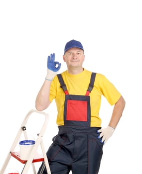 Worker on ladder showing sign okey. Isolated on a white background.