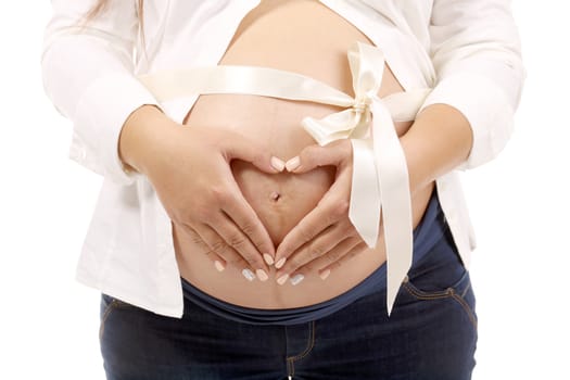 Beautiful pregnant woman belly. Isolated on a white background.