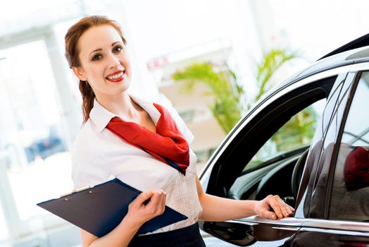 portrait of a young woman in a showroom consultant