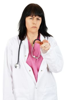 Unhappy or frowning woman doctor pointing her finger, blaming you