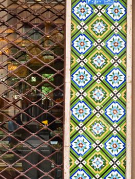 Mosaic tiles decoration on building facade in Tehran, Iran