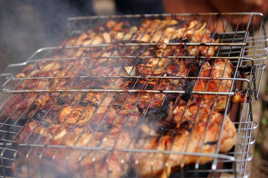 roasting meat on the grill