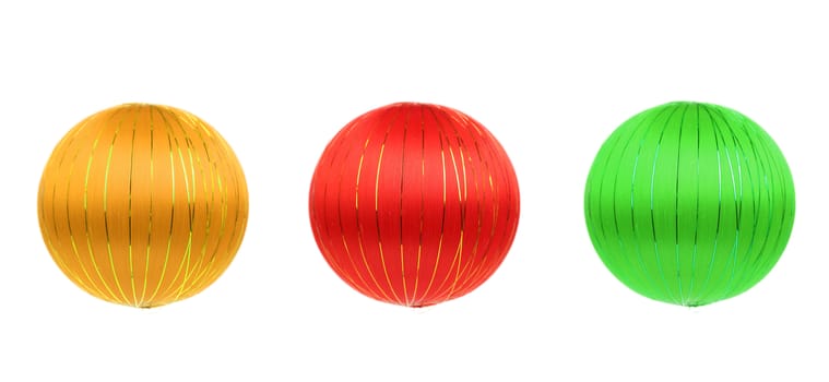 Red green and yellow christmas balls. Isolated on a white background.
