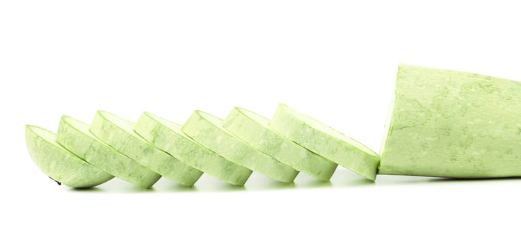 Fresh vegetable marrow and slices. Isolated on a white background.