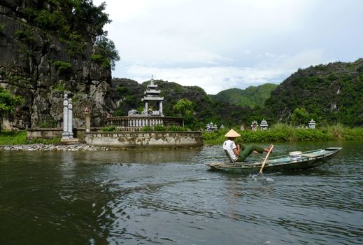 Quiet Ride On Peaceful Tam Coc River In Vietnam