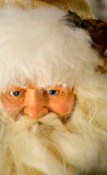 Santa Claus stares out from behind beard