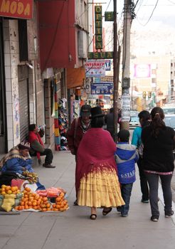 People trading and walking in a street of La Paz, Bolivia, South America