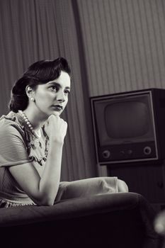 Beautiful woman at home, 1950 styled 