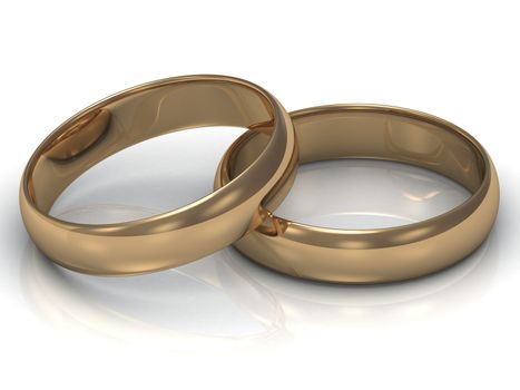 Gold wedding ring is on the other gold ring on a white background