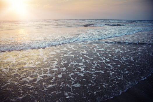 Horizontal photo of the sea during late sunset. Special dramatic darkness