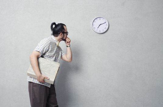 Man checking time in a waiting room 