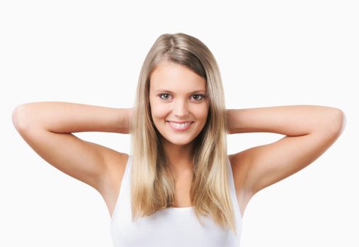 Positive, blonde girl smiling on a white background 