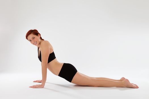 fitness woman exercising upper body push ups