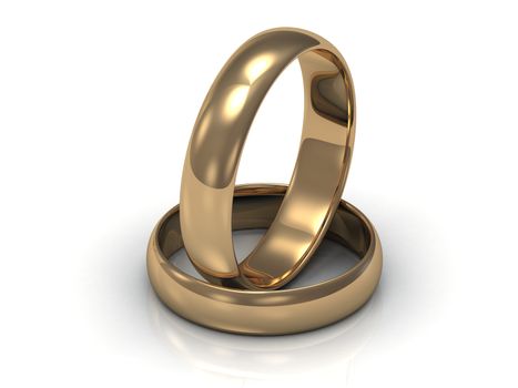 2 Gold wedding rings. Ring in the ring on a white background